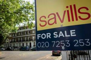 Savills, a leading estate agency, has revised its house price forecast for this year, projecting a growth of 2.5 percent, a significant turnaround from its previous prediction of a 3 percent fall.
