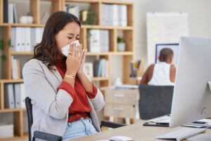 The rising tide of workplace sickness in the UK now costs over £100 billion annually, largely due to lost productivity caused by "staggering" levels of presenteeism, a new report reveals.