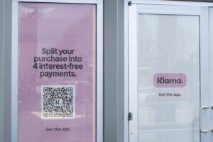 Klarna, the buy now, pay later (BNPL) fintech leader, has cut over 1,000 jobs as part of a strategic shift towards artificial intelligence, with further reductions expected before a potential stock market float.