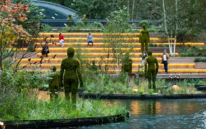 Canary Wharf welcomes European eels and rare wildlife as part of its Eden Dock project, aiming to increase biodiversity and attract more office workers and residents amidst a decline in occupancy.