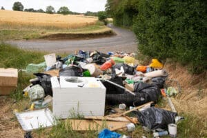 Rogue waste collectors who fly-tip household rubbish will be targeted under a government crackdown.